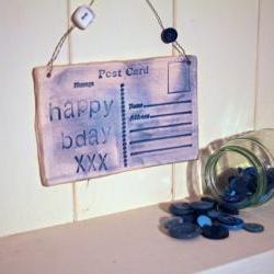 Ceramic Birthday Postcard. Lightly glazed in blue. Handmade made in Wales, UK